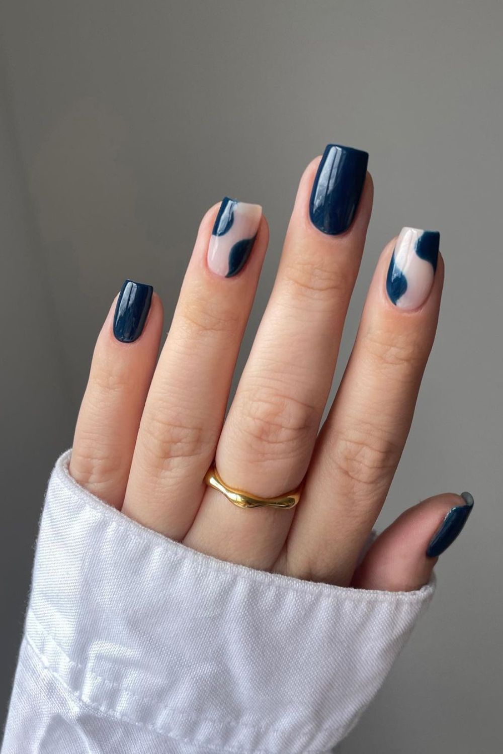 Navy blue nails with negative space accent