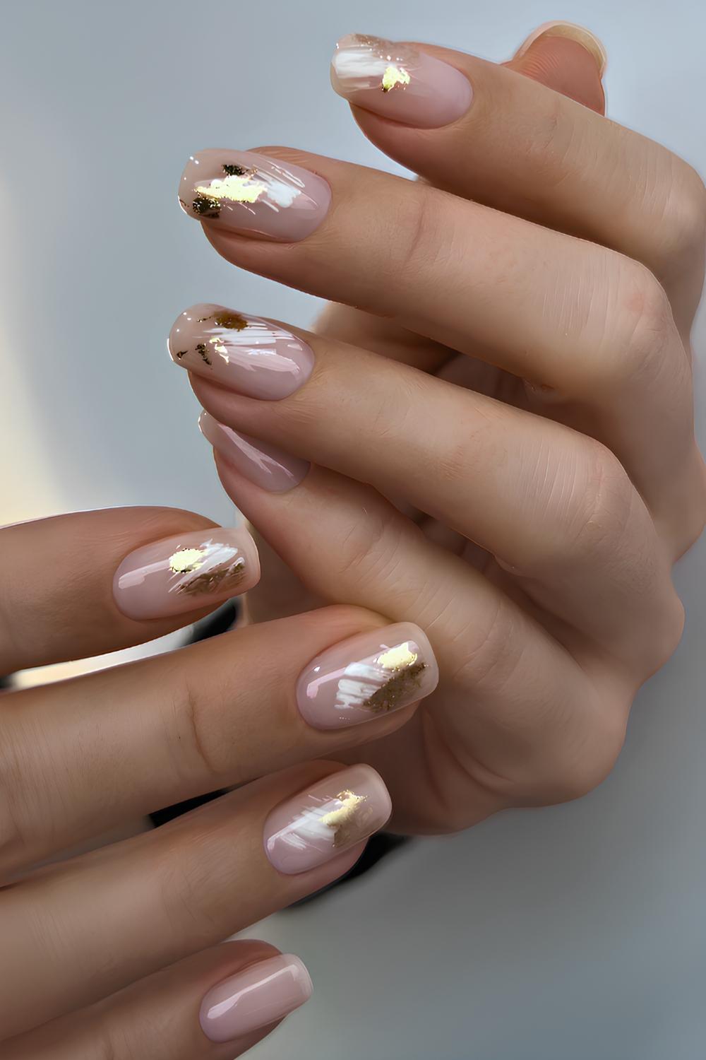 Neutral mani with gold and white brushtroke art