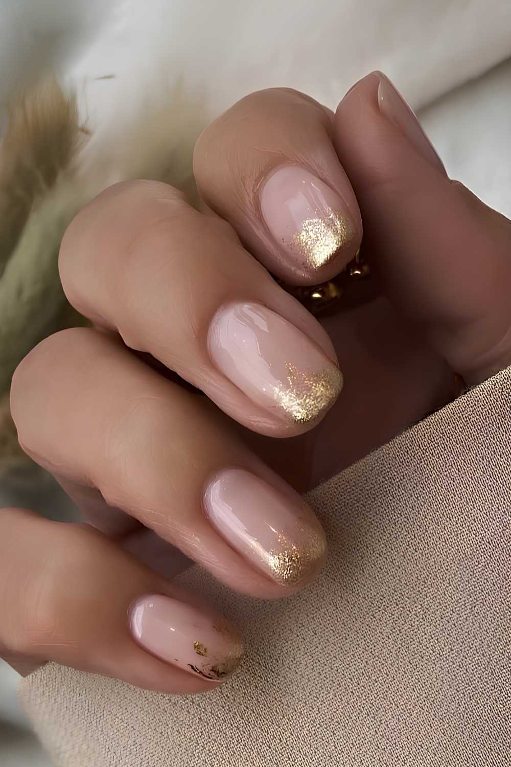 Neutral mani with gold foil ombre accent