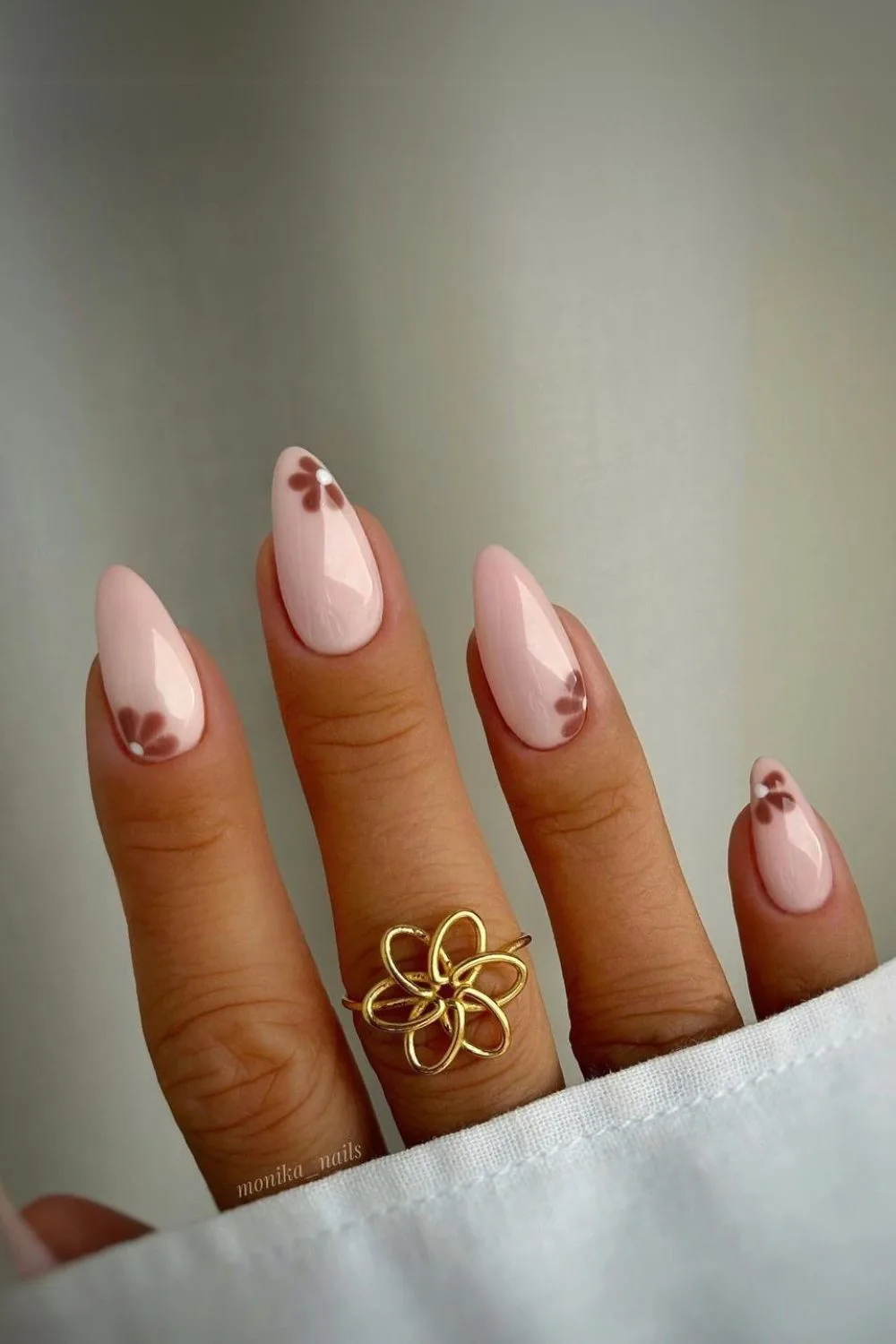 Neutral nails with brown flower designs