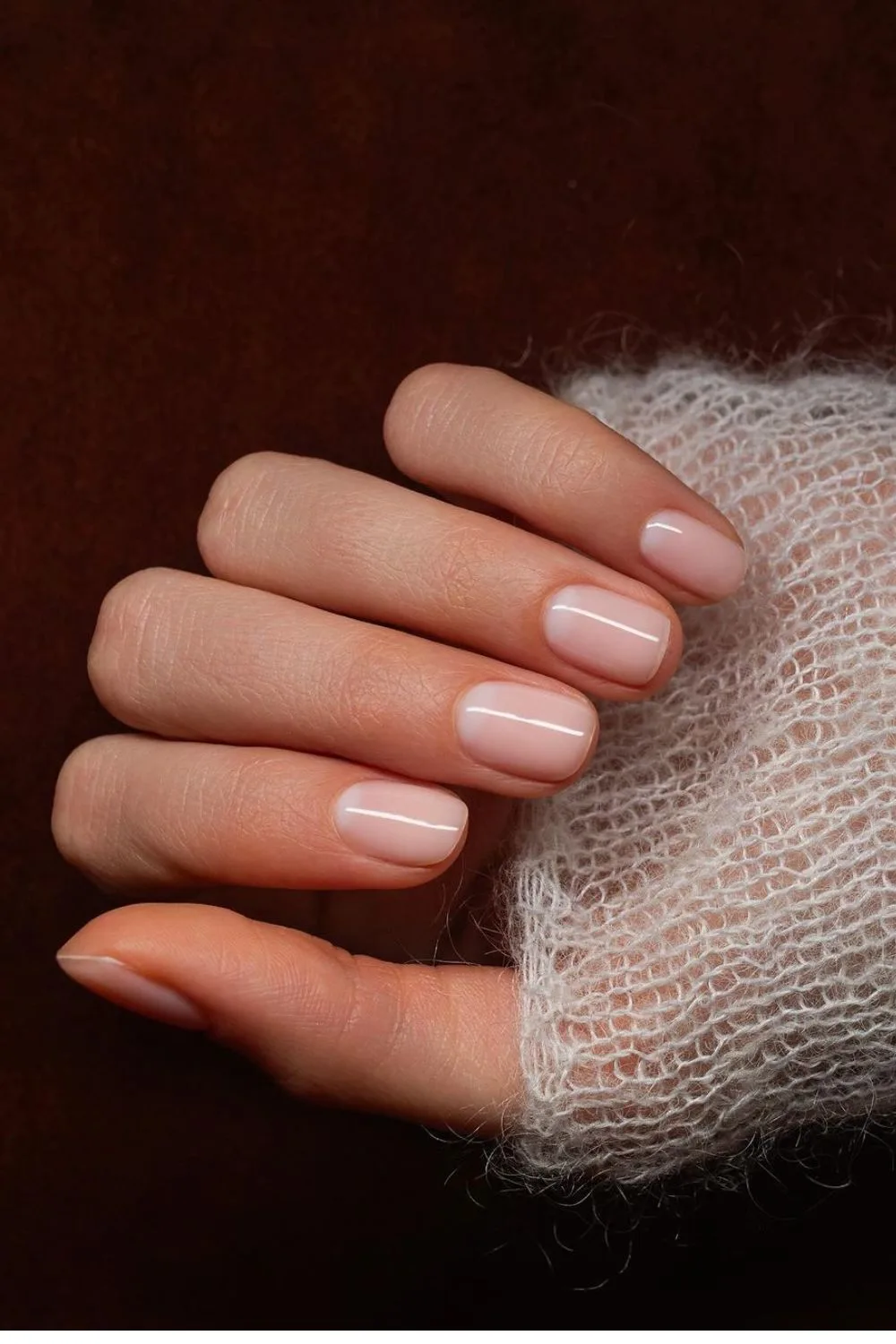 Nude nails with soft half moon design