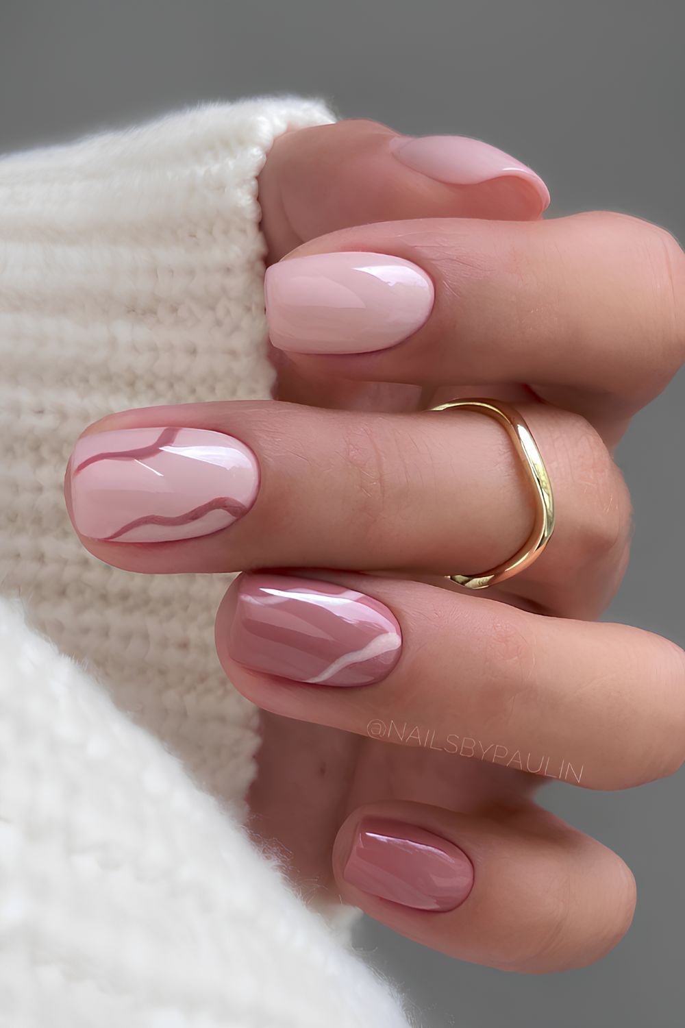 Pink and mauve nails with line art