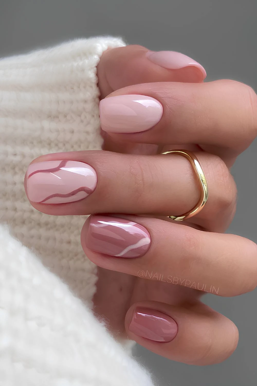 Pink and mauve nails with line art