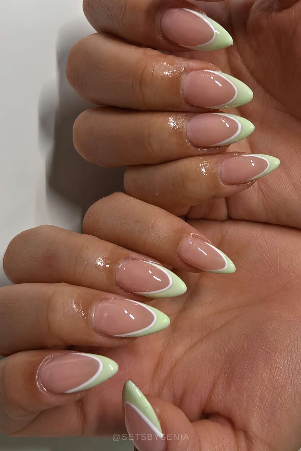 Pistachio green French mani with white outlines