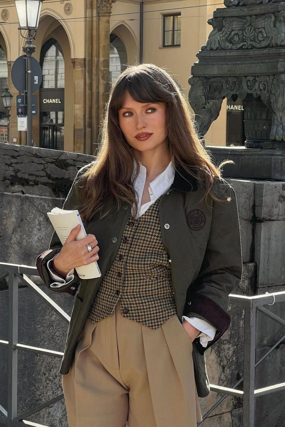 Plaid vest and khaki trousers with button-down shirt