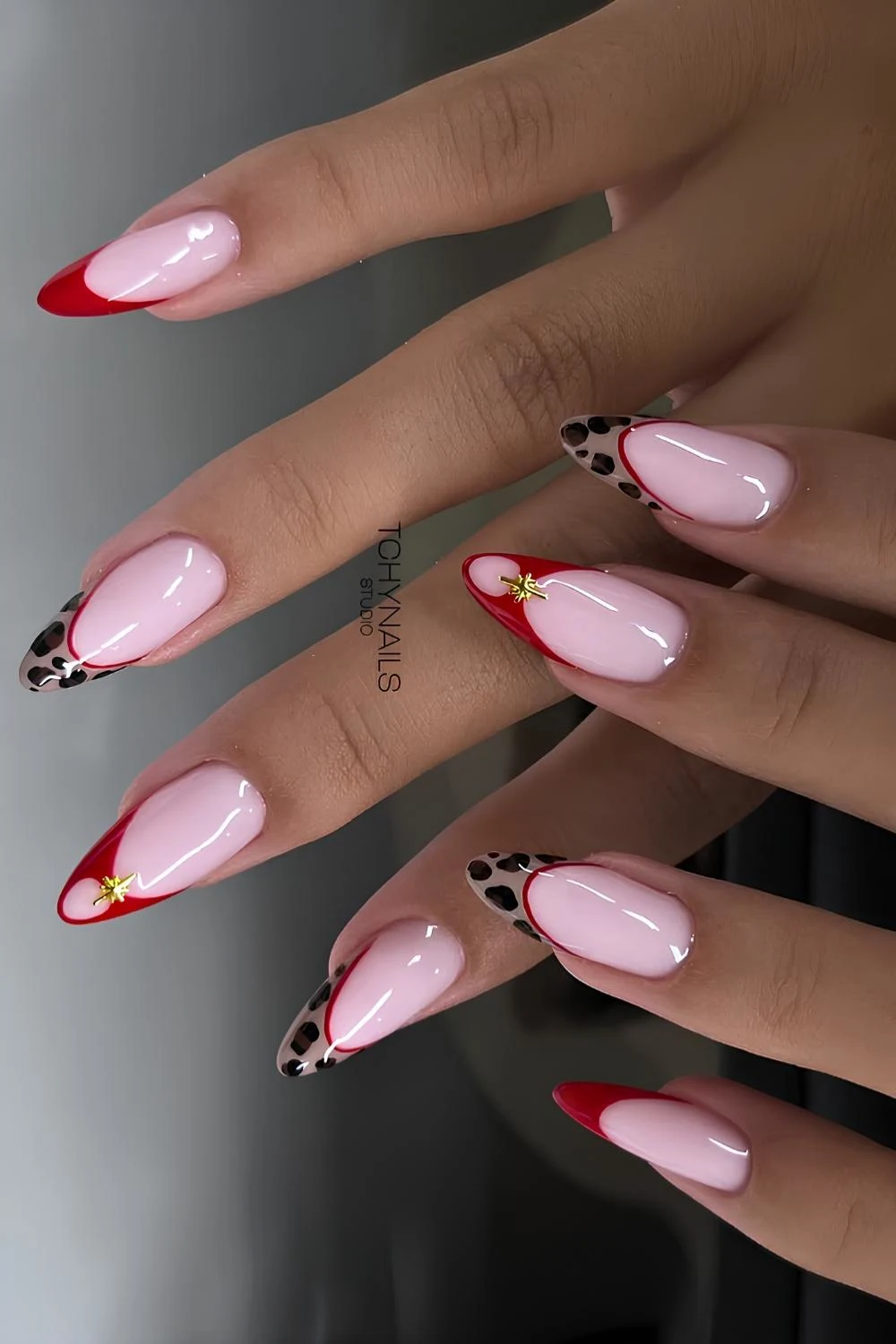 Red French nails with leopard print details