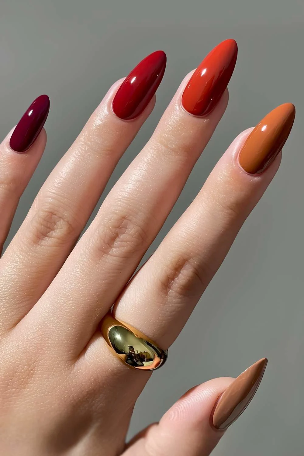 Red and brown skittle nails