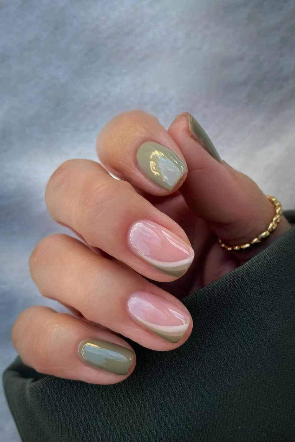 Sage green fall nails with swirl side tips