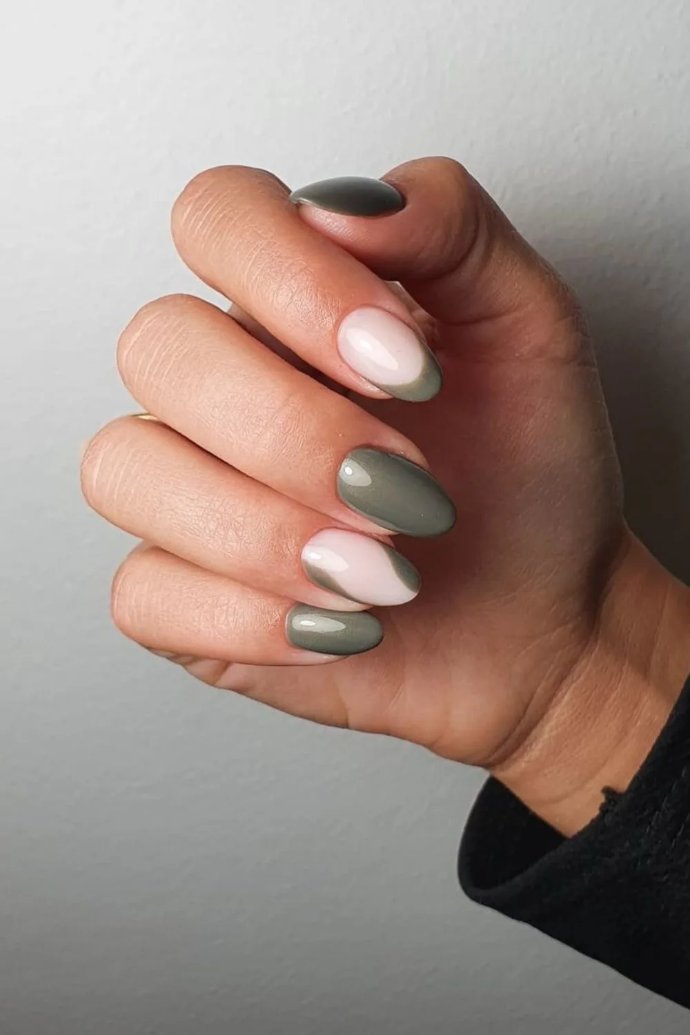 Sage green nails with negative space accent