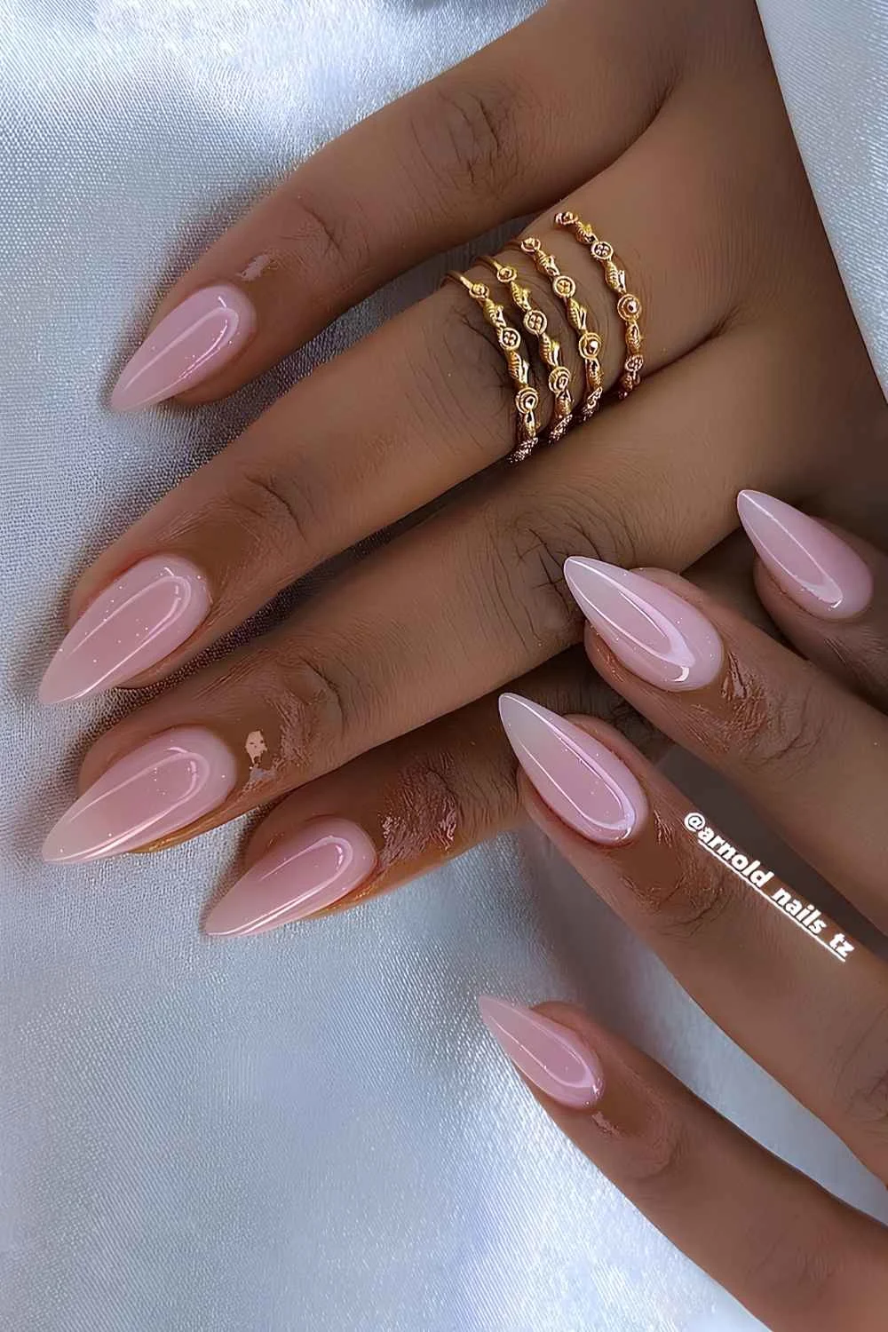 Sheer and shimmery light pink nails