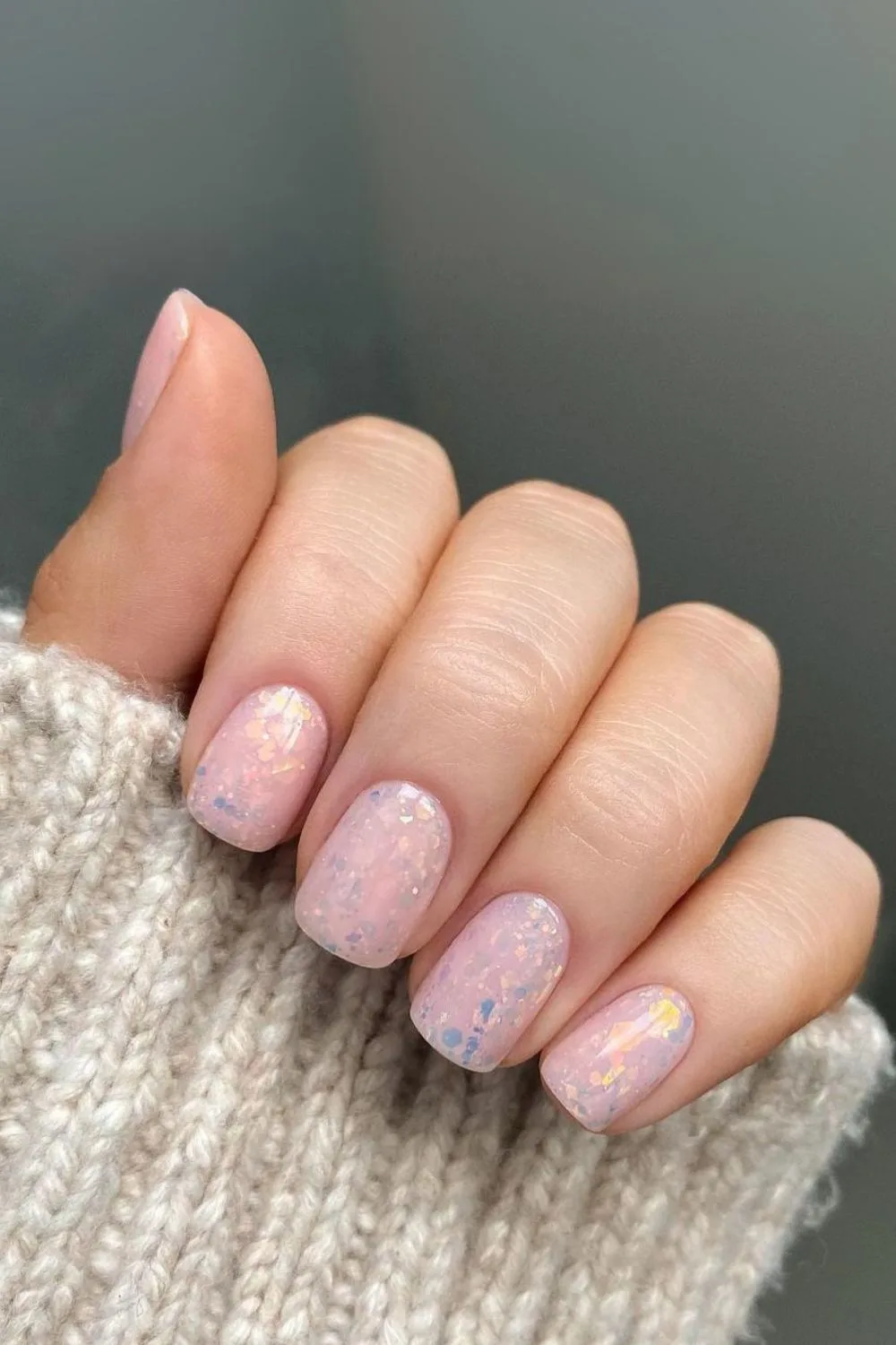 Shimmery opal-inspired nail design