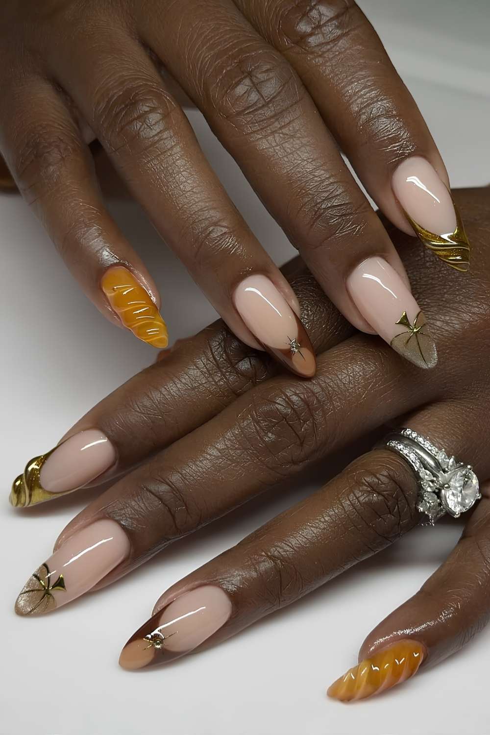 Thanksgiving nails with pumpkins and gold details