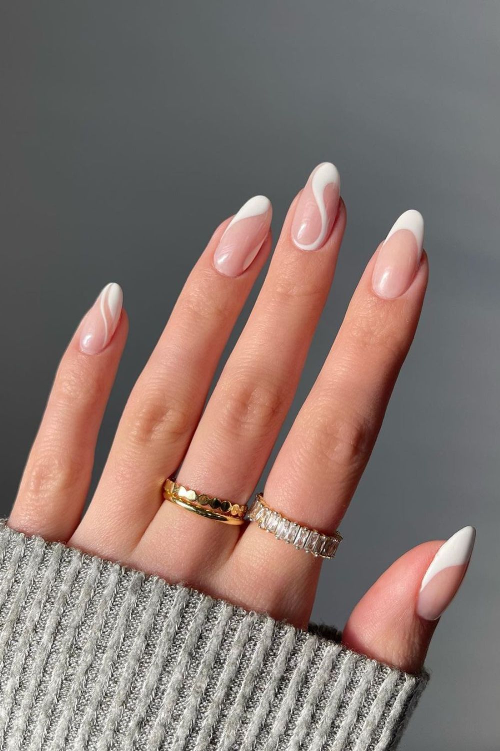 White French nails with swirls