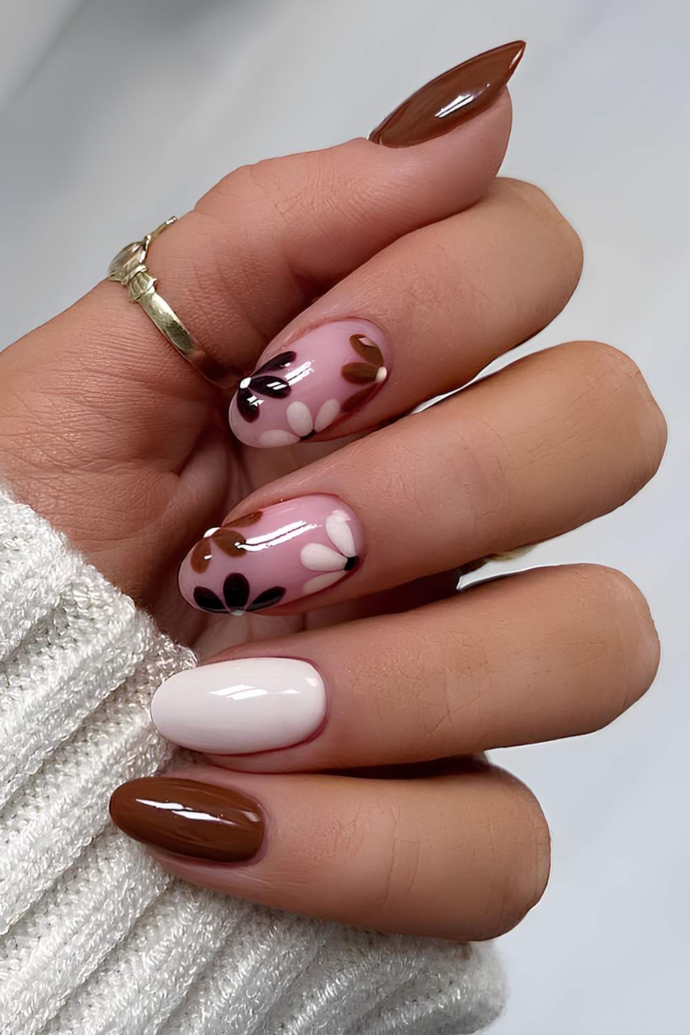 White and brown floral nail design