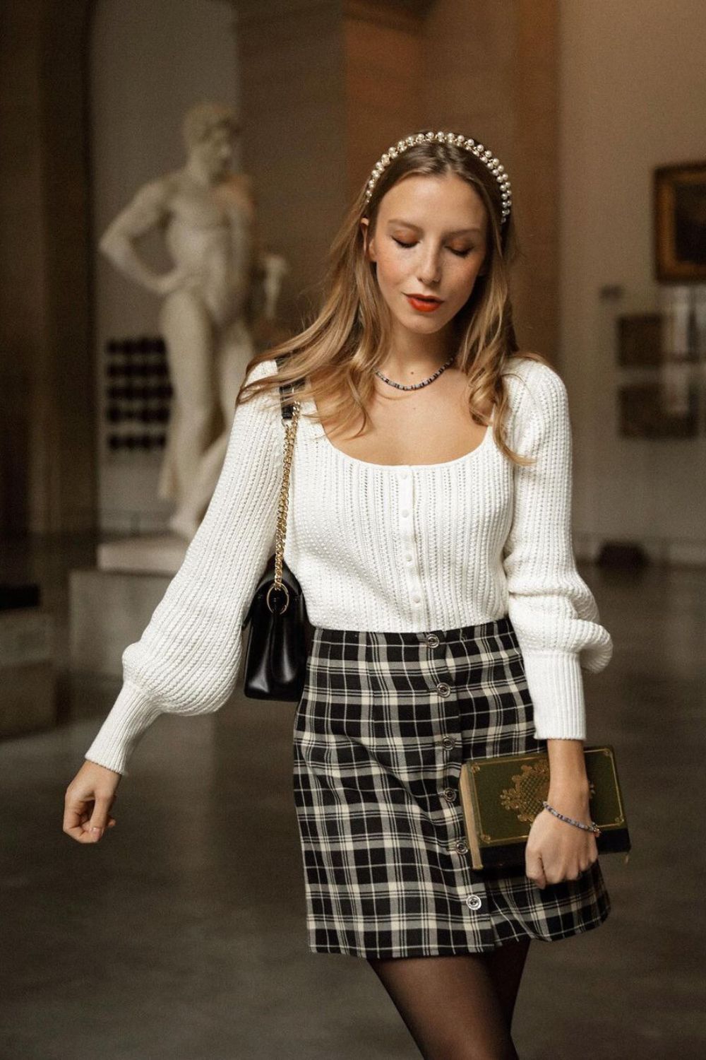 White cardigan and plaid mini skirt combo