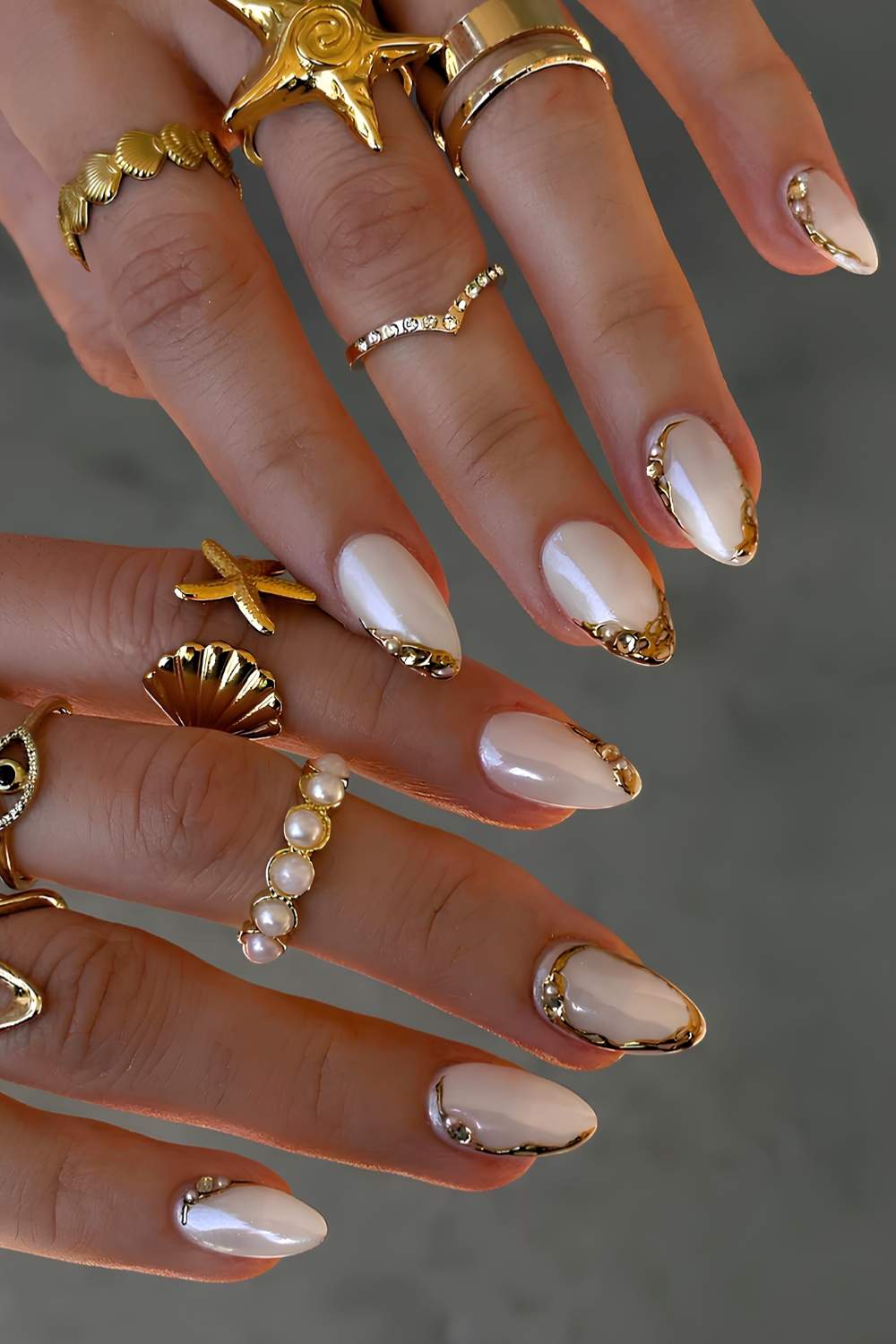 White chrome nails with gold detailing