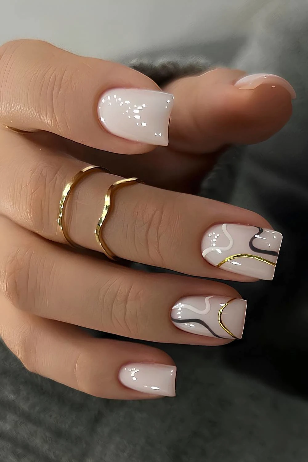 White fall nails with swirl art