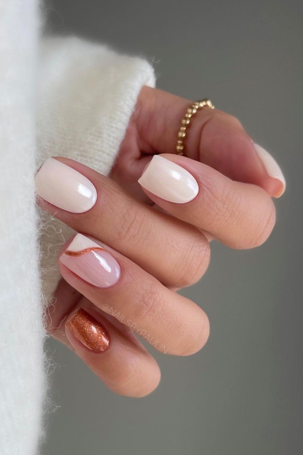 White nails with copper accents