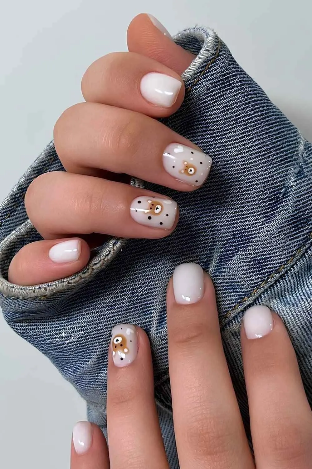 White nails with teddy bear art