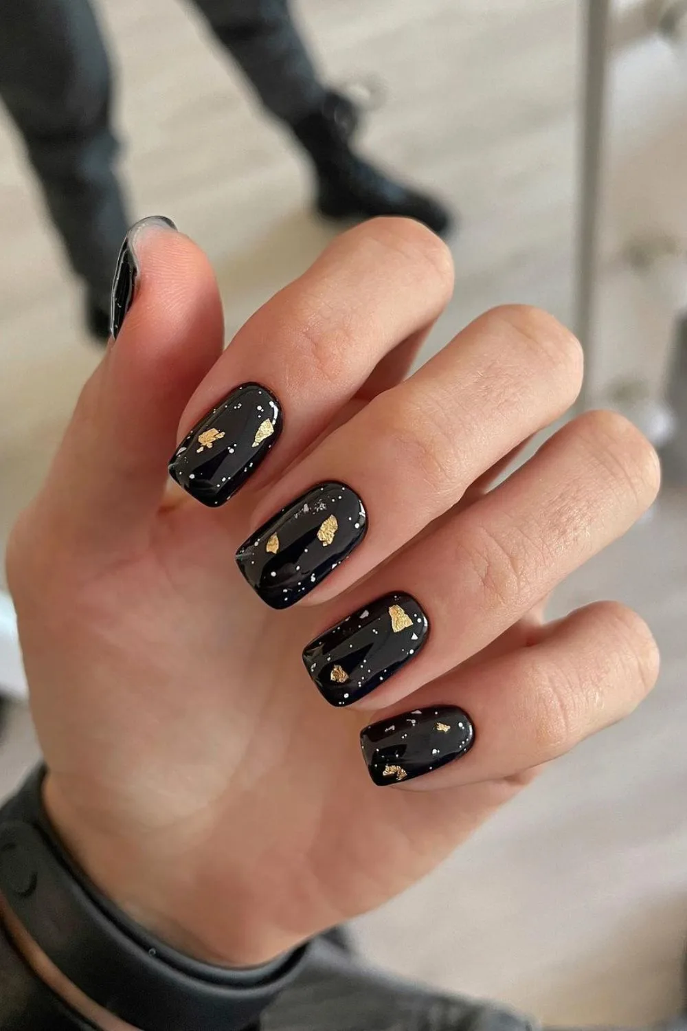 black short nails with gold accents