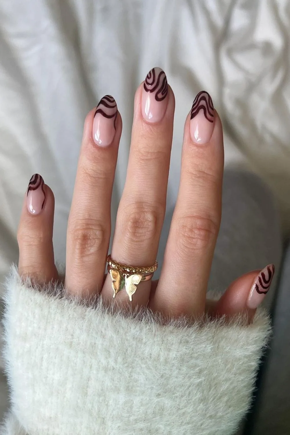 brown swirl french nails