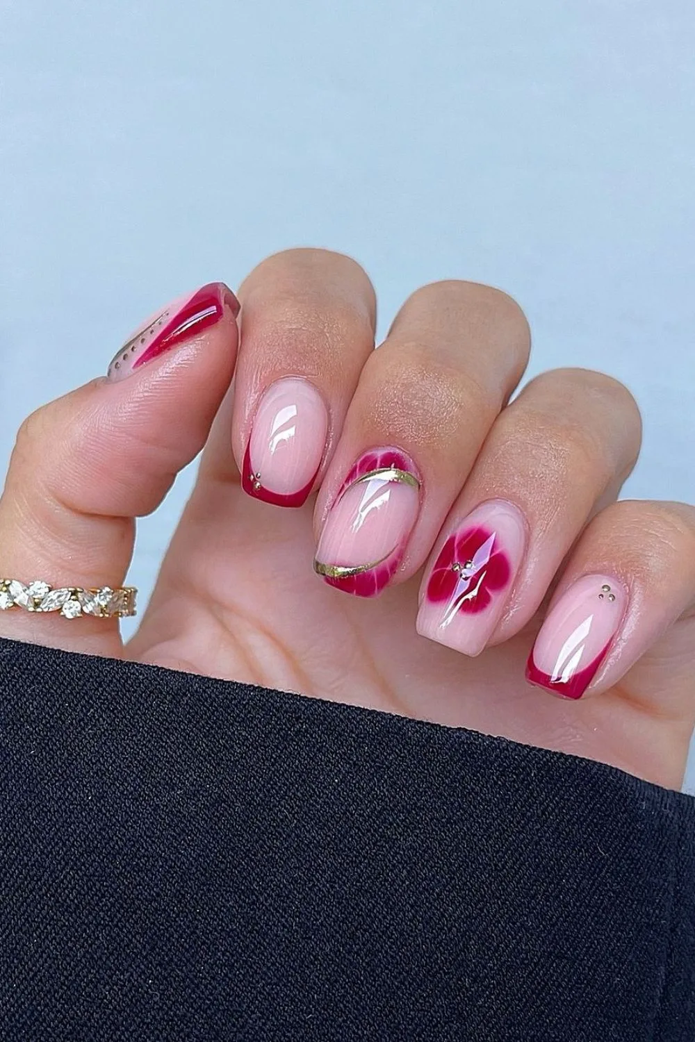 wine red nails with floral design