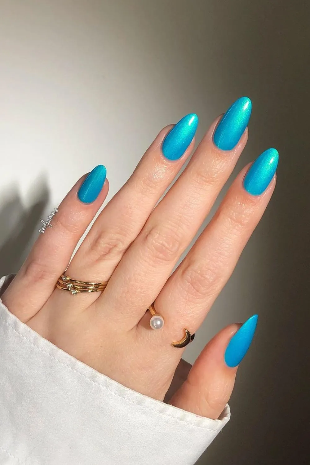 Aqua blue satin-effect nails