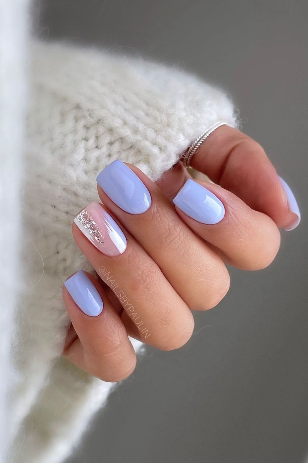 Cornflower blue nails with subtle glitter accent