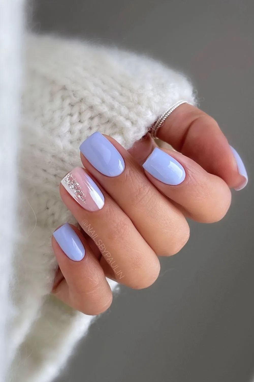 Cornflower blue nails with subtle glitter accent