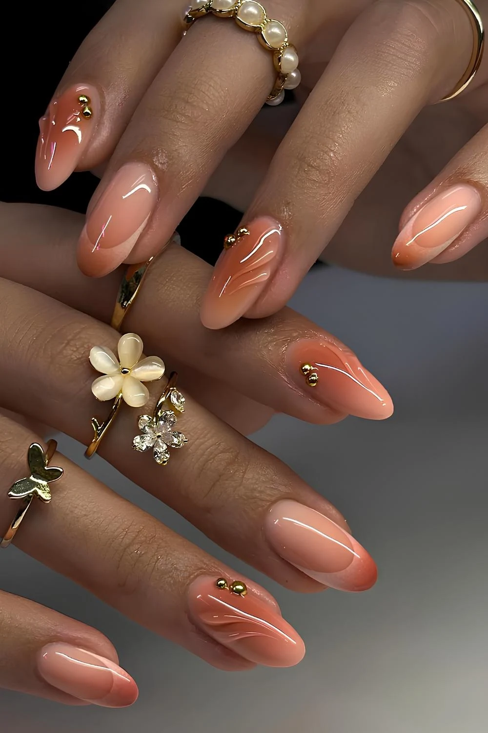 Beige and dark orange aura nails