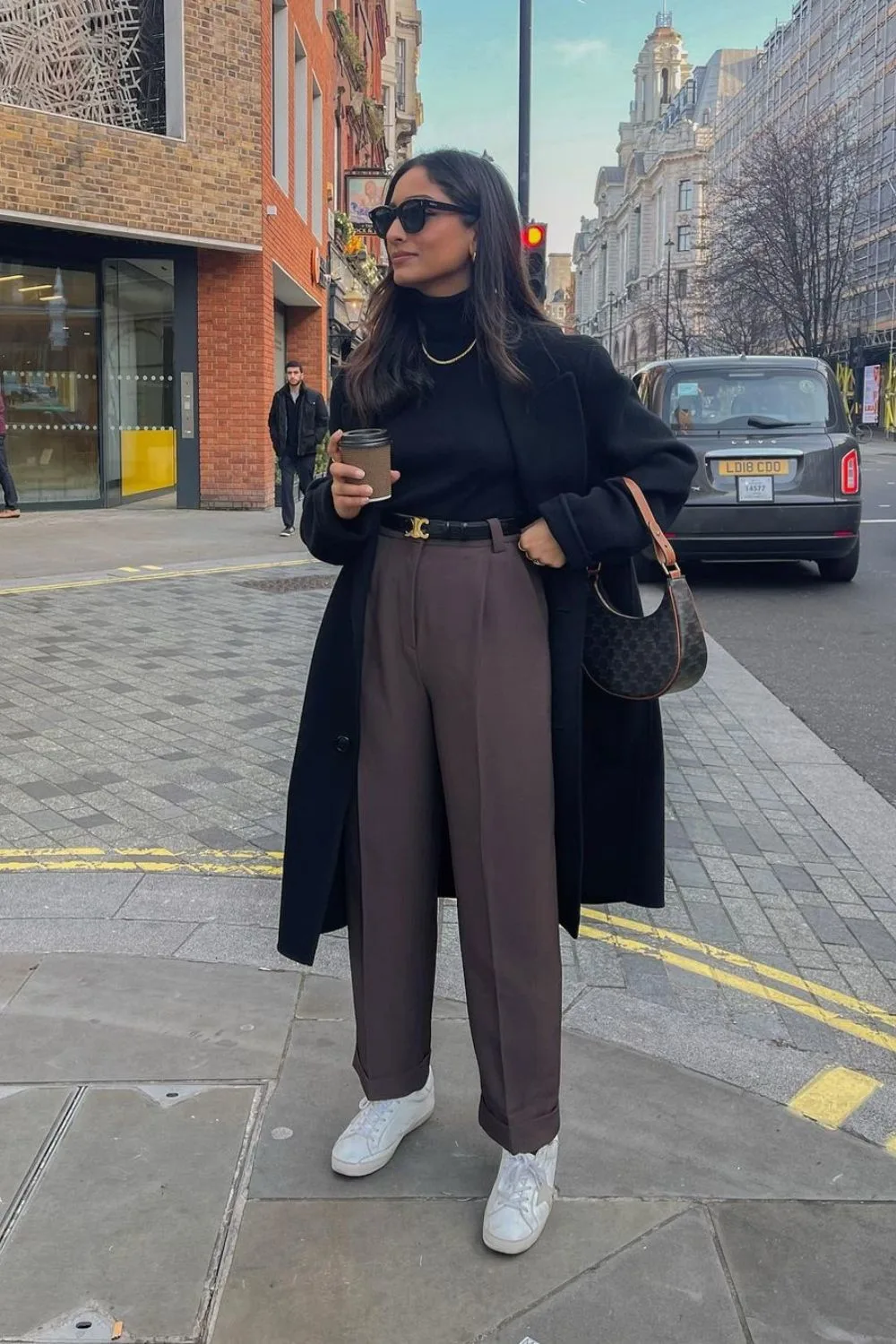 Black Coat & Sneakers with brown pants