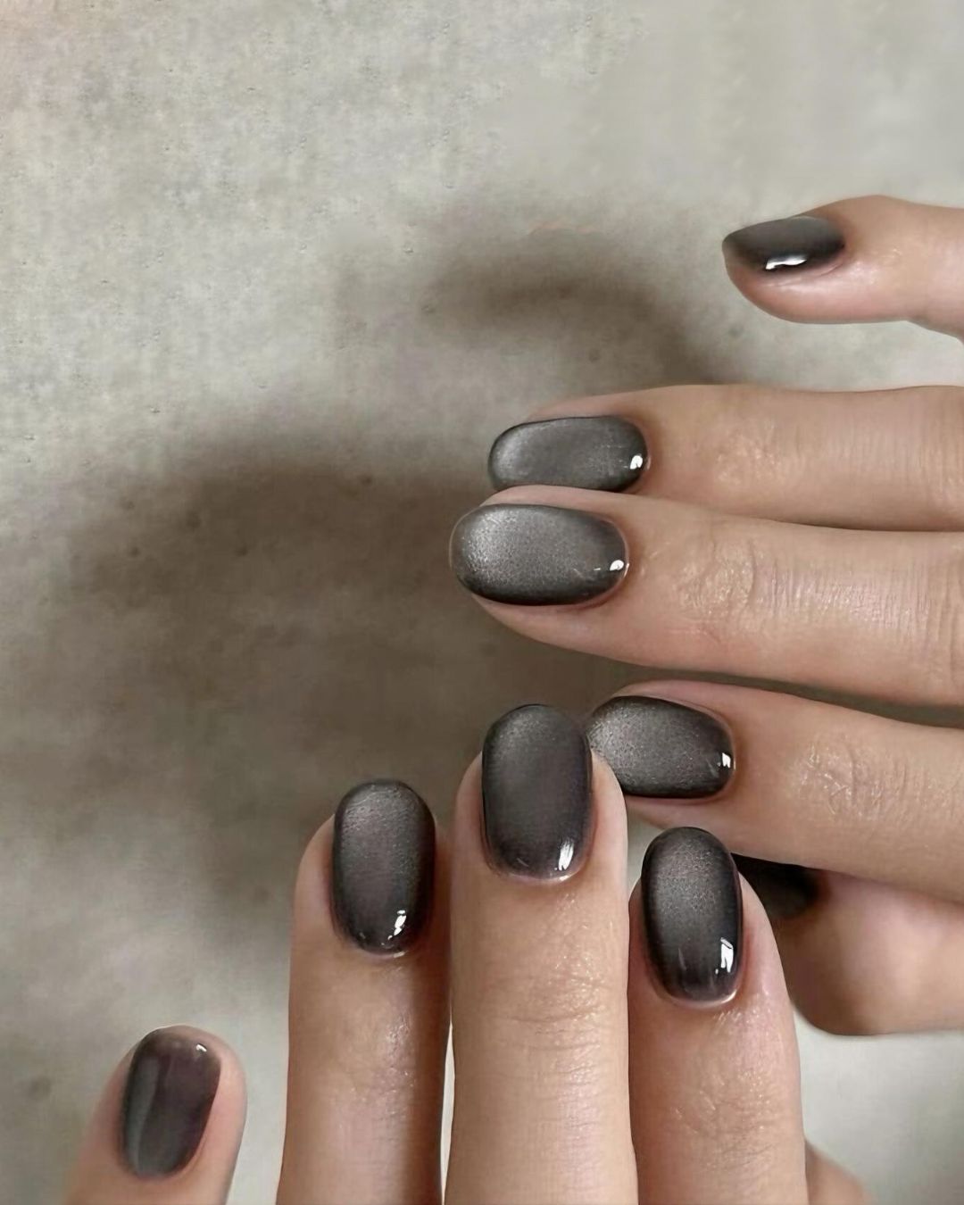 Black and gray cat eye effect nails