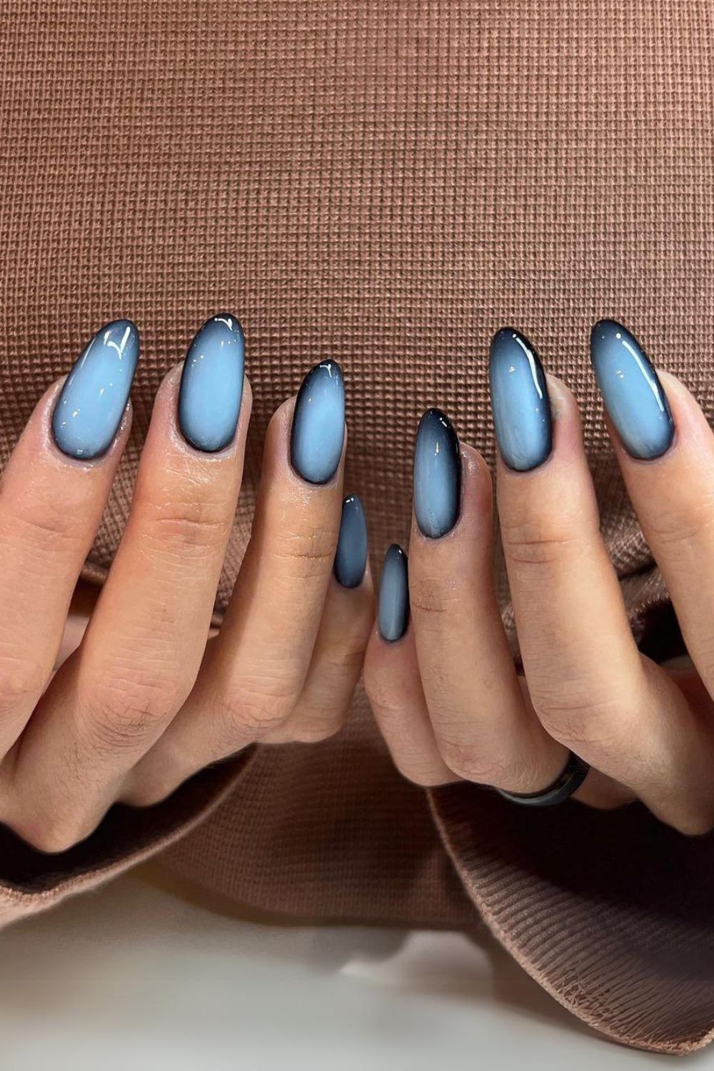 Black and light blue halo-effect nails