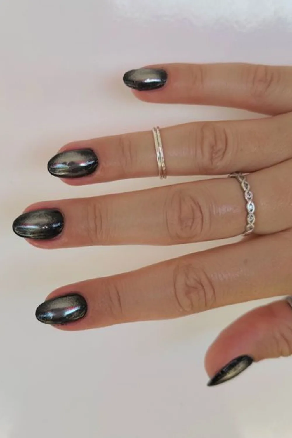 Black chrome aura nails