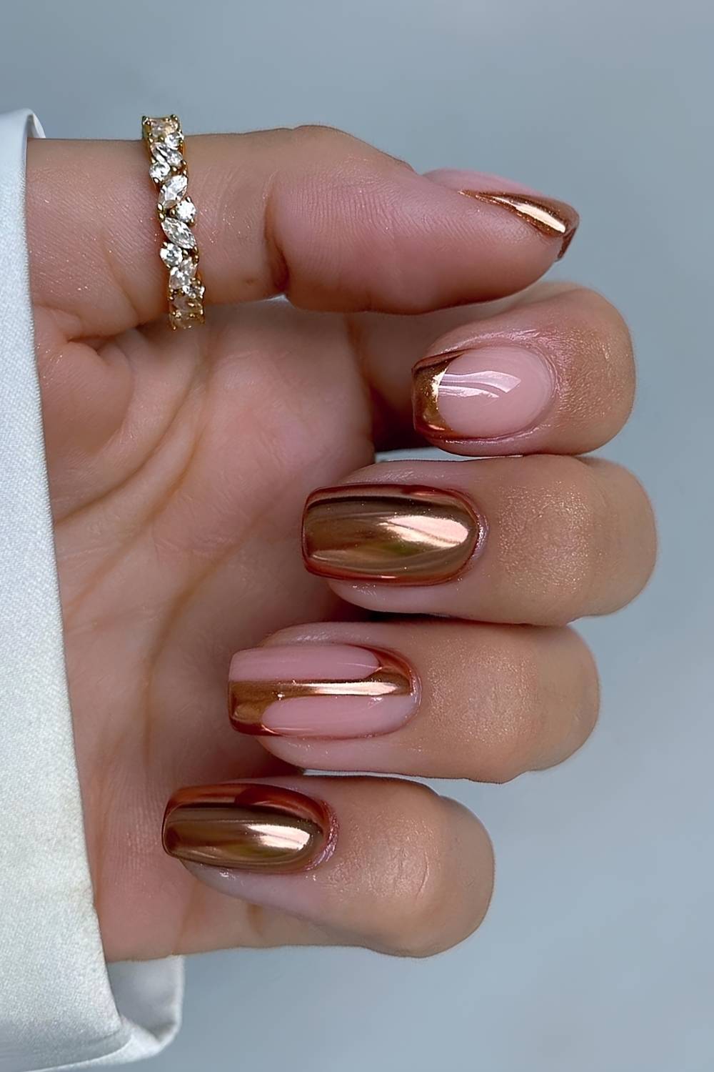 Bronze gold nails with negative space design