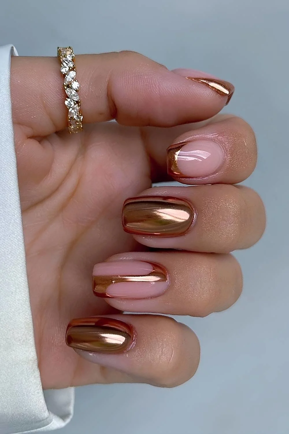 Bronze gold nails with negative space design