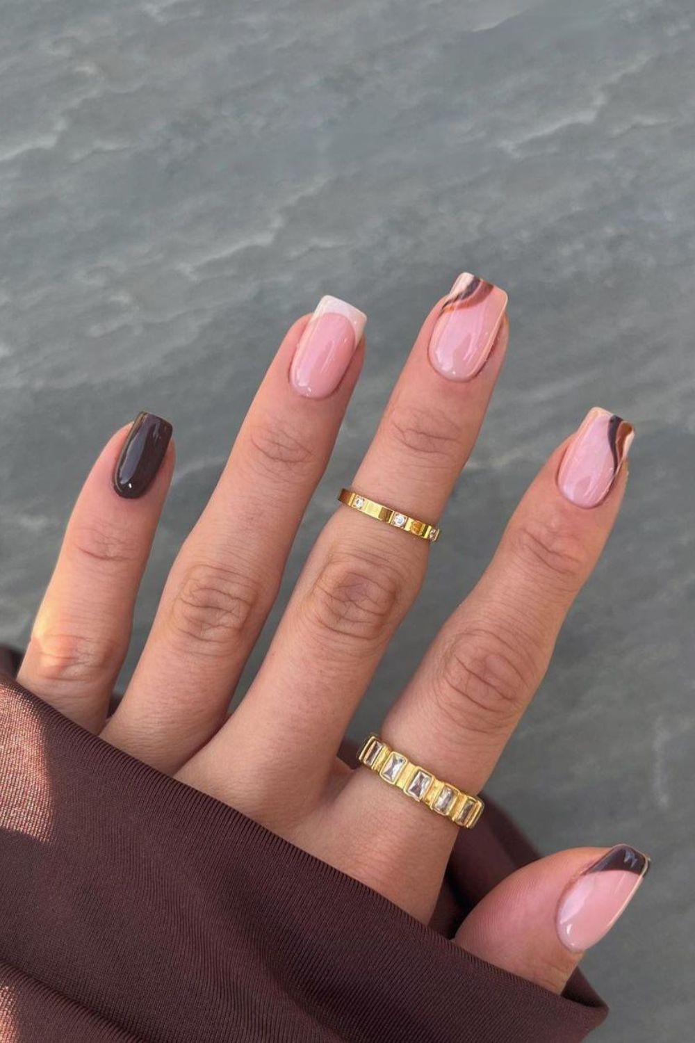 Brown and beige swirly French nails