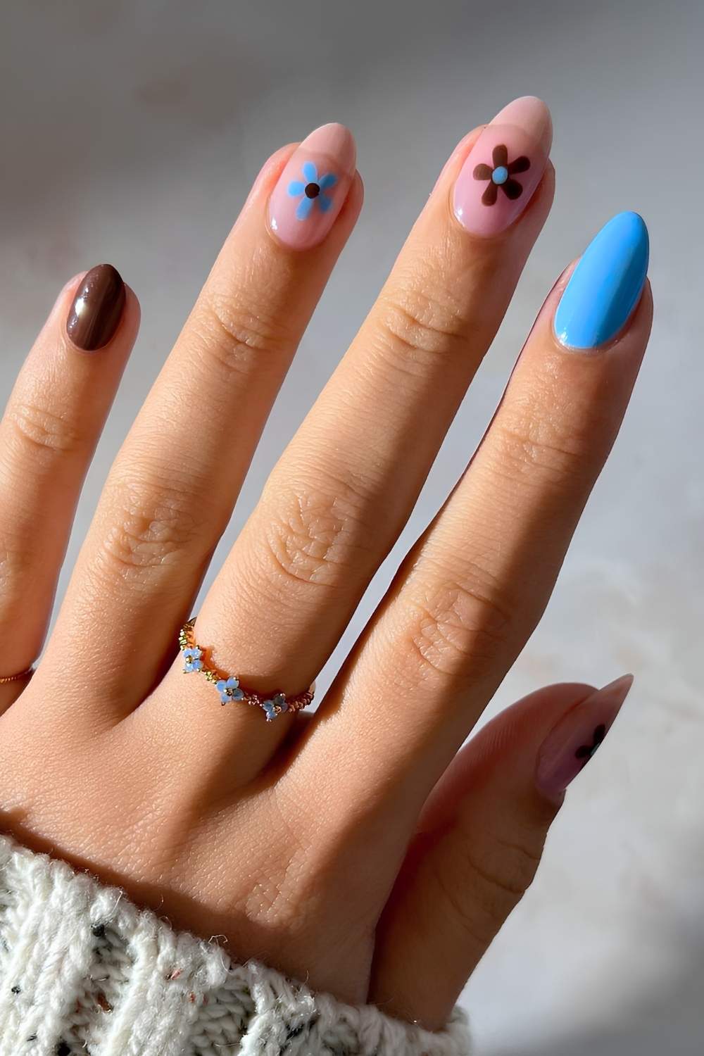 Brown and blue floral manicure