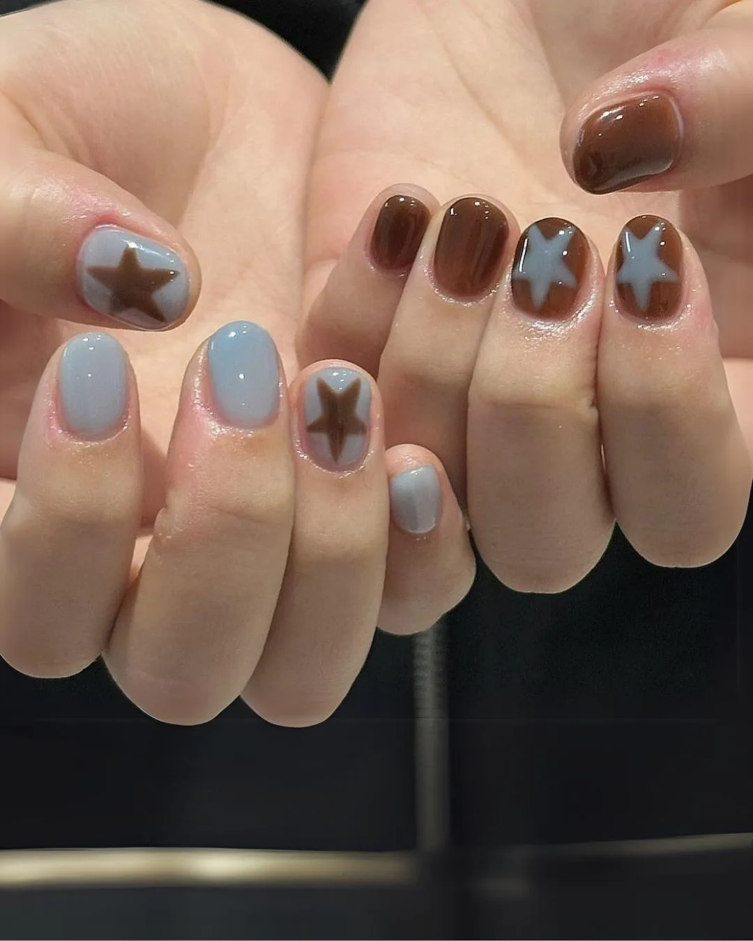 Brown and blue nails with stars