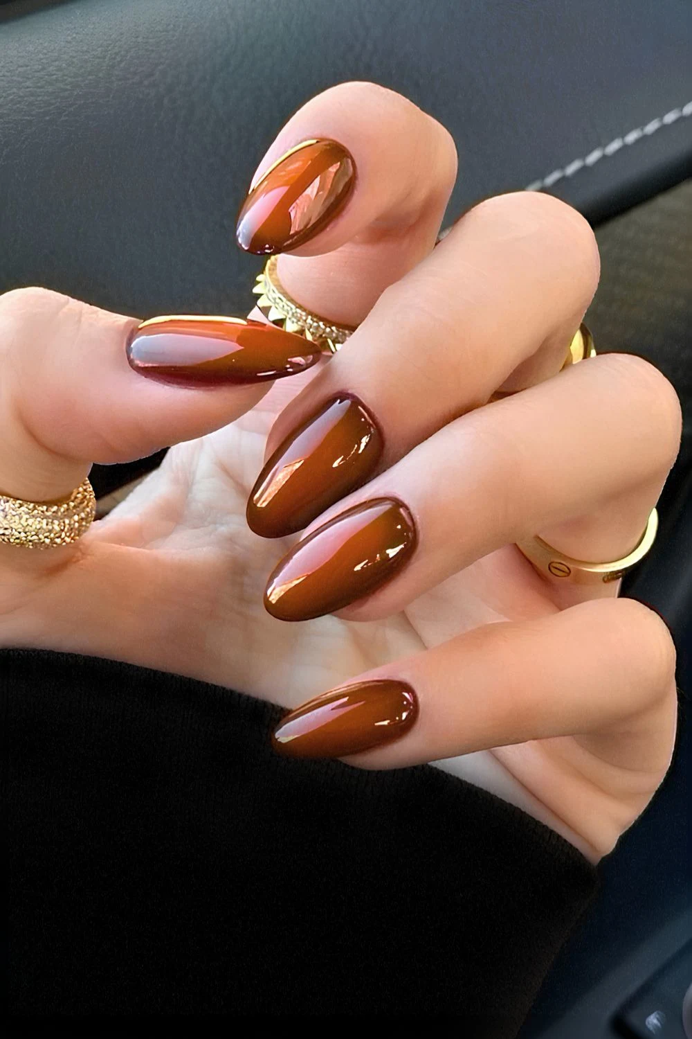 Brown and burnt orange aura nails