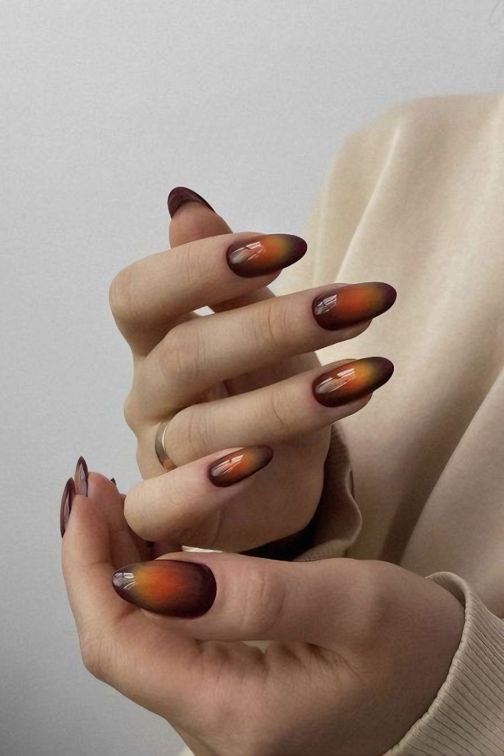 Brown and orange aura nails