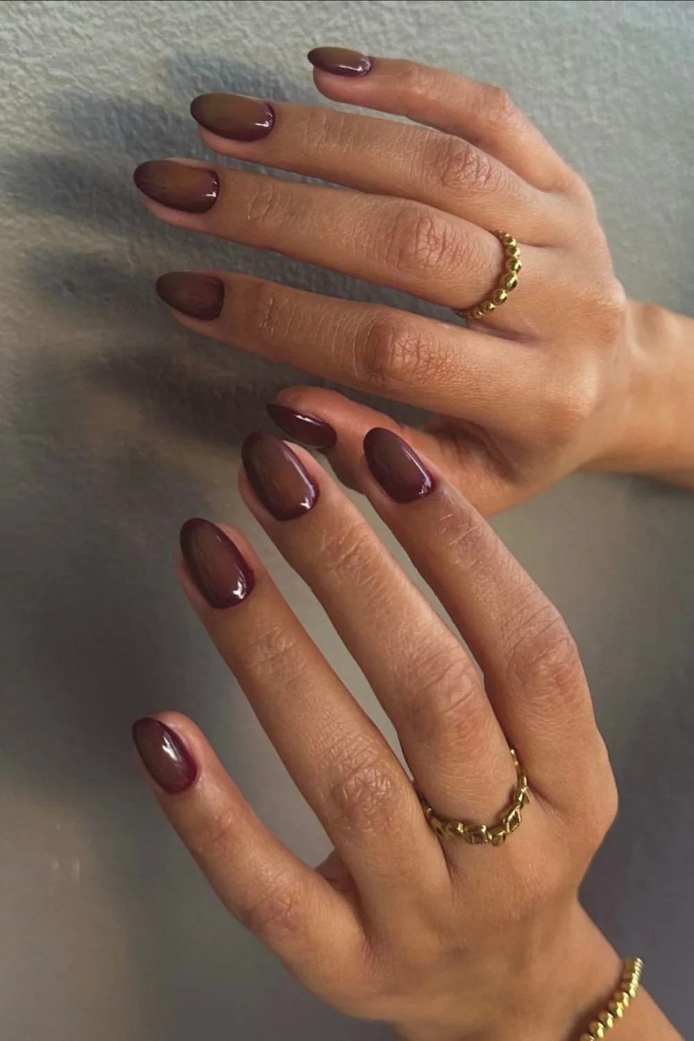 Brown nails with subtle aura effect