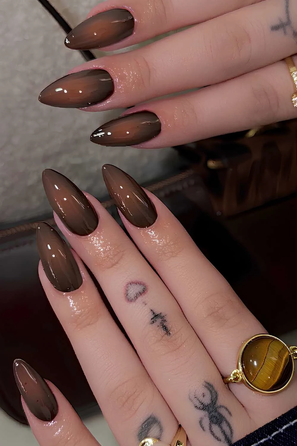 Brown on brown aura manicure