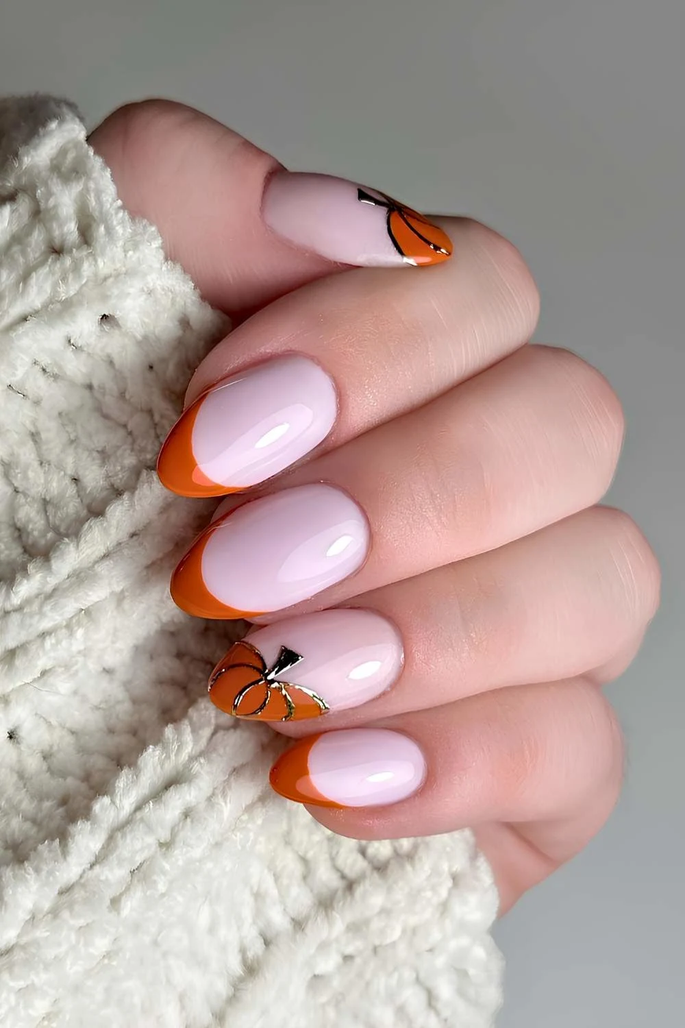 Burnt orange French nails with pumpkins