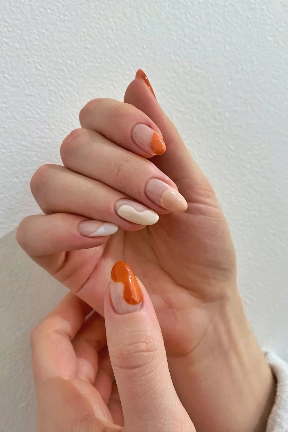 Burnt orange and nude nails