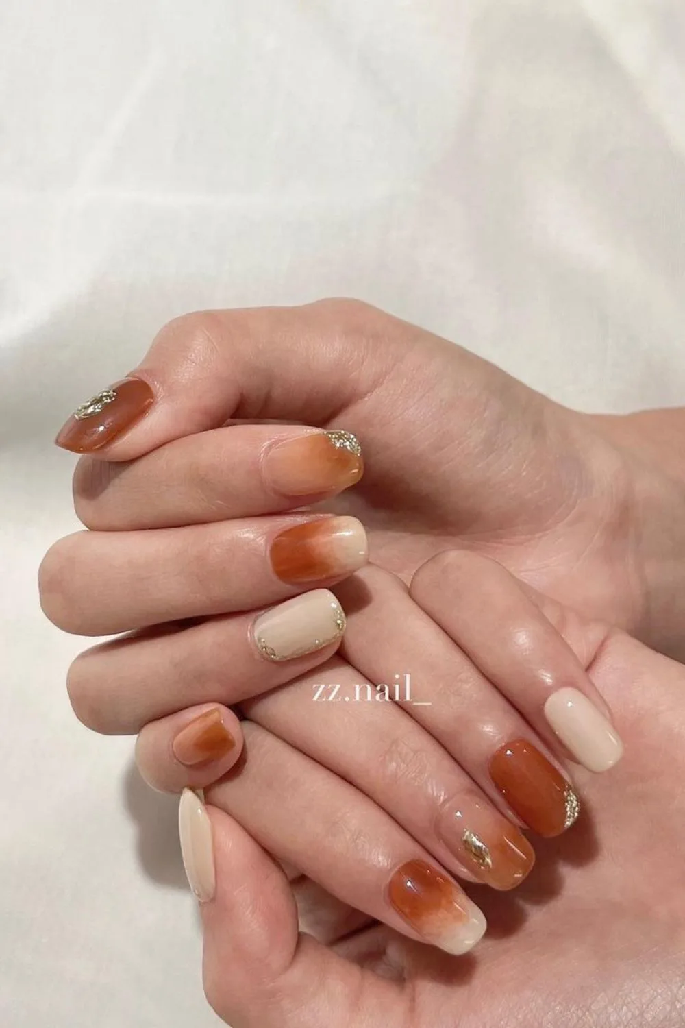 Burnt orange and vanilla gradient effect nails