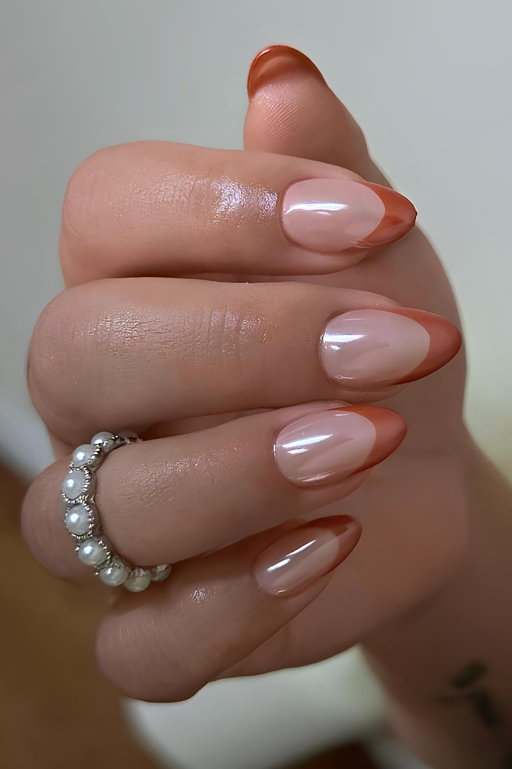 Burnt orange chrome French manicure