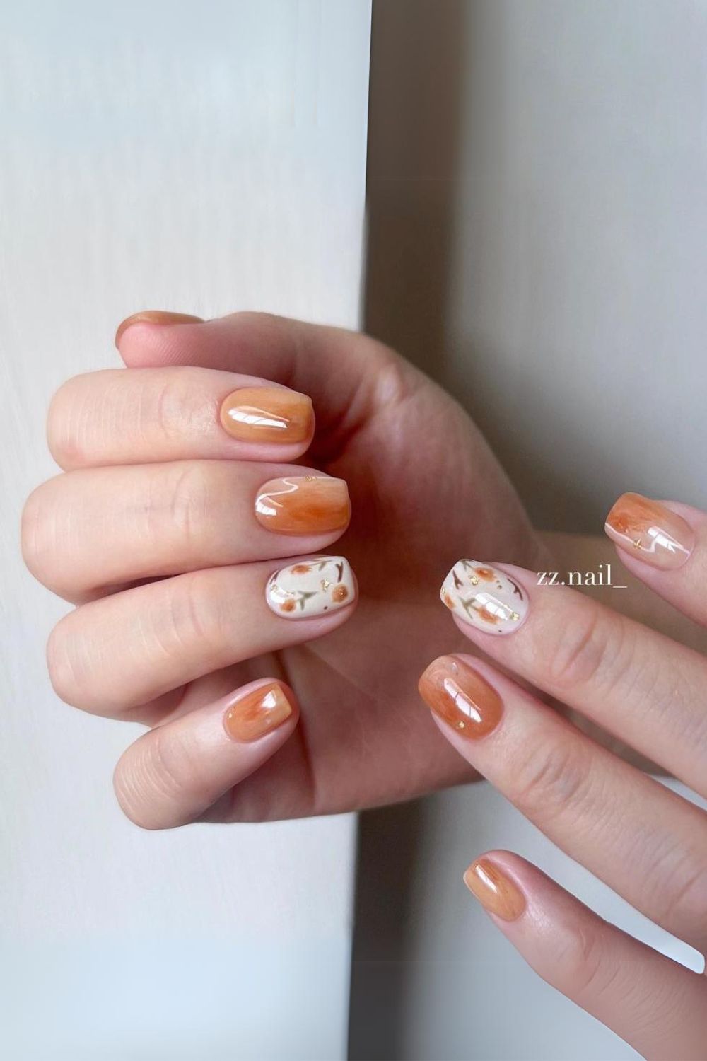 Burnt orange floral nails