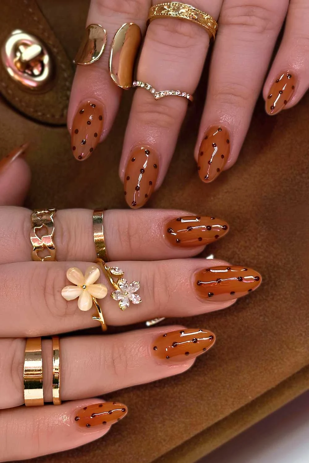 Burnt orange nails with polka dots