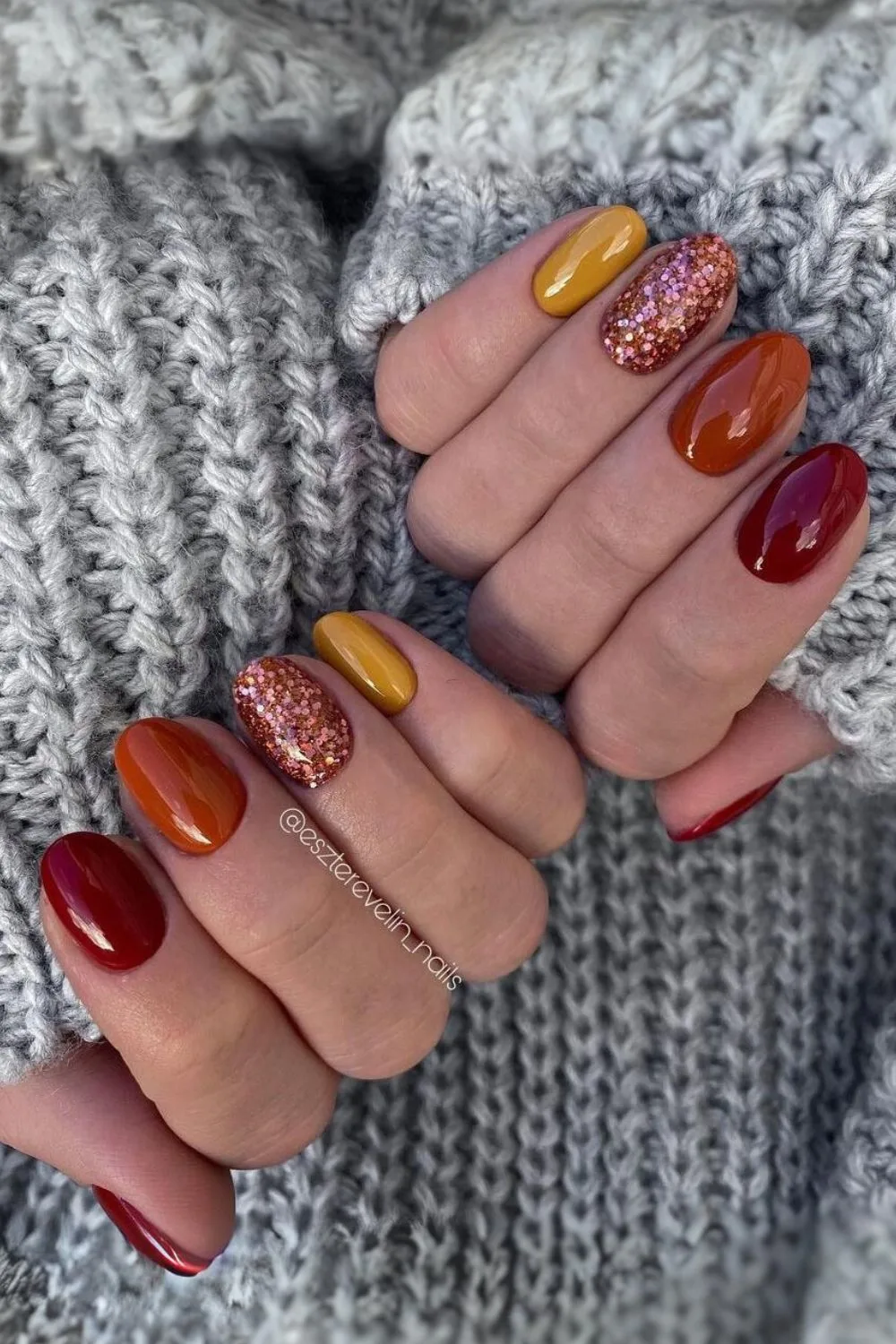 Burnt orange skittle nails with glitter